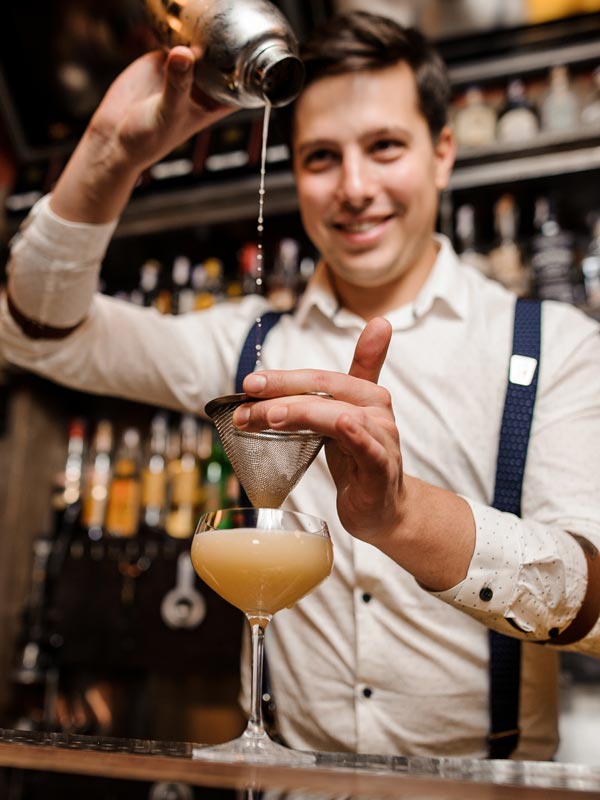bartender pouring drink